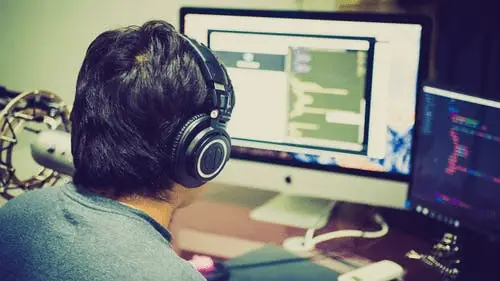 A person looking at a computer