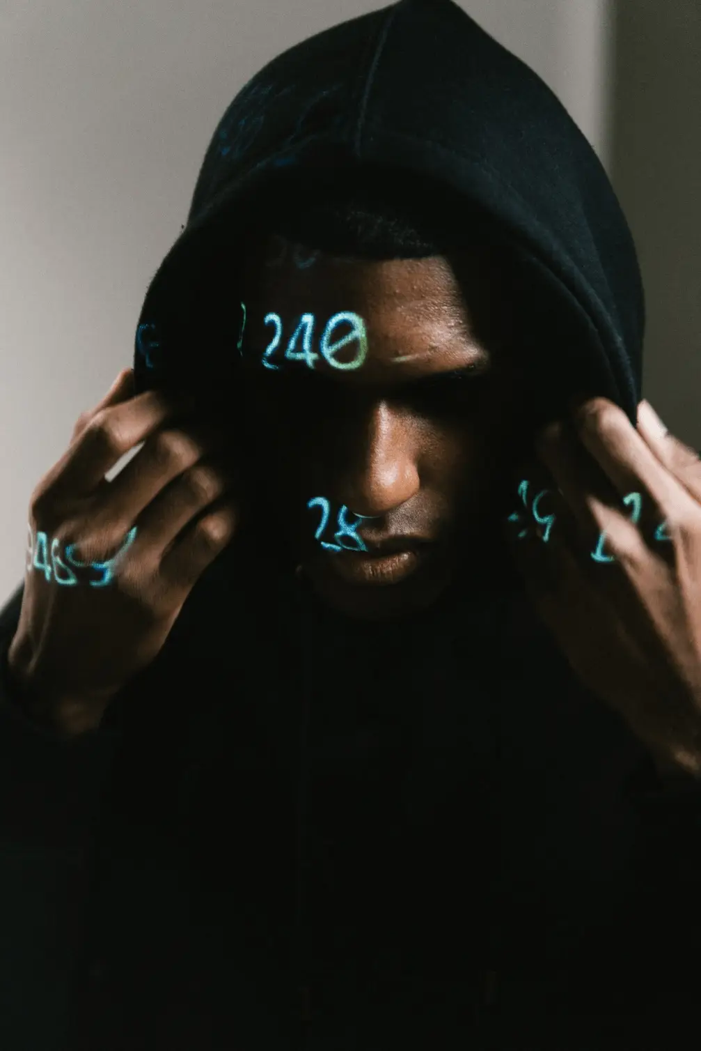 Person wearing a black hoodie