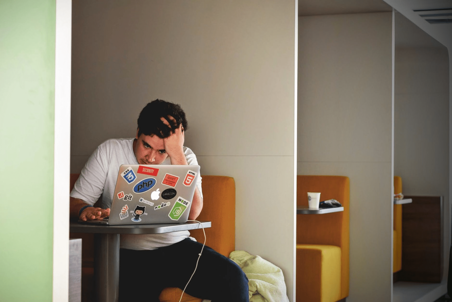 Person looking stressed as printer is not working