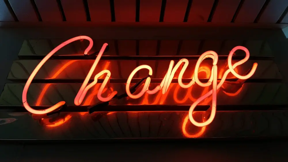 A neon sign for the word “change”