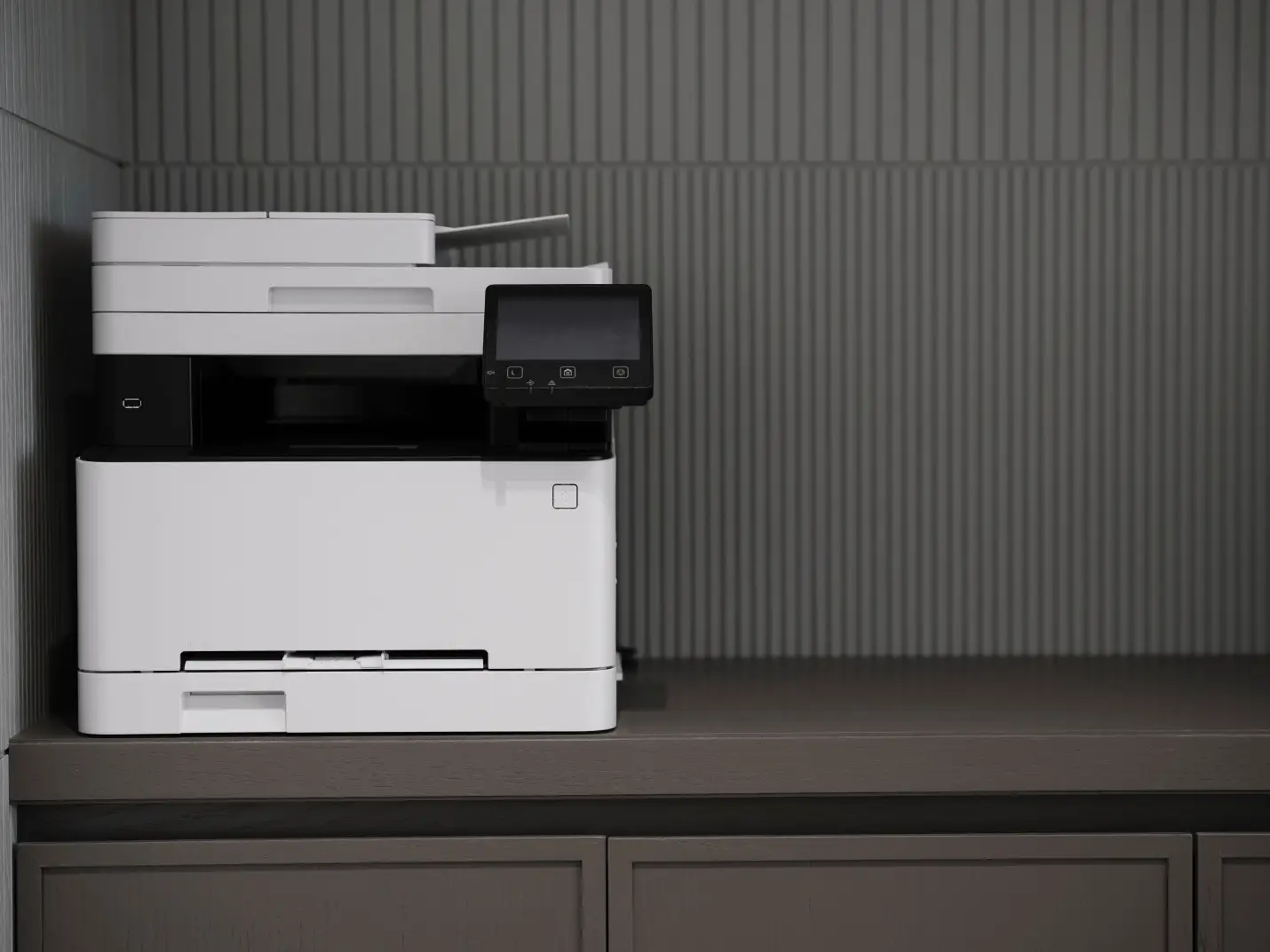 A scanner on a table at an office