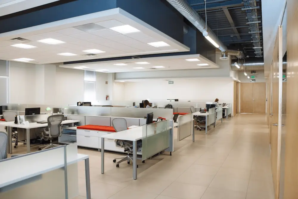 A large office with office equipment.